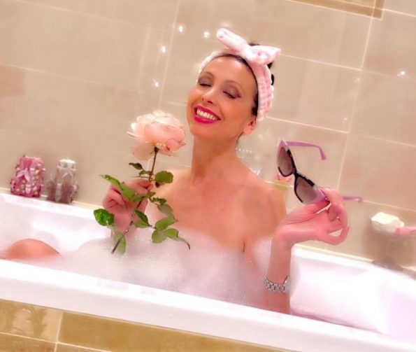 Lorena Baricalla enjoying the bath with roses